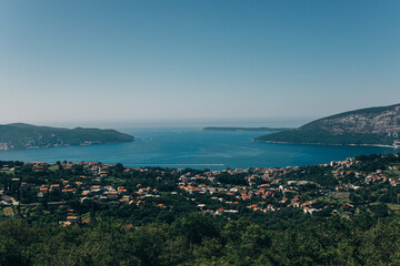 Fototapeta na wymiar Amazing view of Herceg Novi city and the sea in a sunny day. Travel destination in Montenegro.