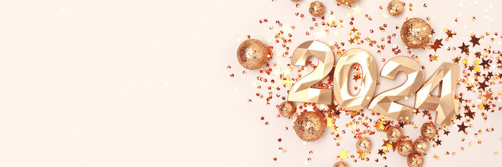 Banner with 2024 golden numbers and shiny stars confetti on a beige background. New Year concept with copy space.