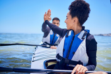 Water, high five with man and woman in kayak winning at lake, beach or river race for exercise...