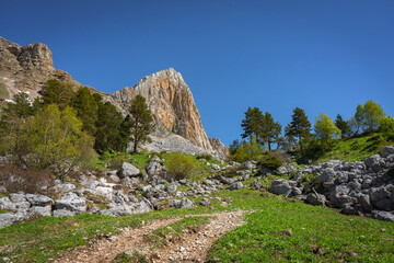 View of the rocks in the vicinity of Mount Fisht. Trail in the mountains.