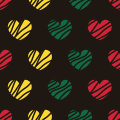 Hearts textured seamless pattern in national African colors