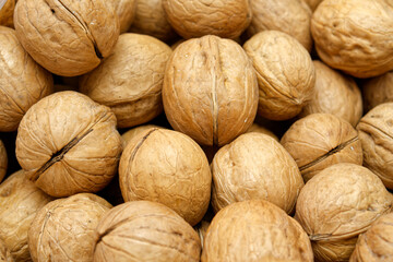  a lot of delicious pile of walnuts closeup   