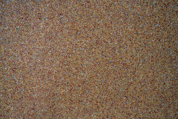 Multicolored powder plastic background selective focus.