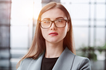 Dream big and make it happen. Portrait of a confident young businesswoman standing with her arms crossed in an office.