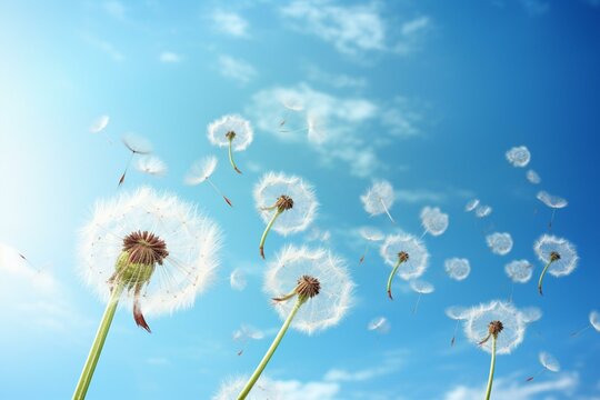 Dandelion seeds floating against a blue sky. Generative AI
