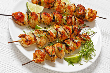 chicken souvlaki with thyme and lime on plate
