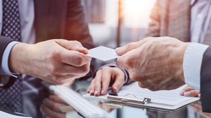 Fototapeta premium businessman offer personal contact information to customer, acquaintance concept