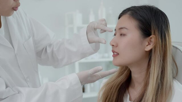 plastic surgery, beauty, Surgeon or beautician touching woman face, surgical procedure that involve altering shape of nose, doctor examines patient nose before rhinoplasty, medical assistance, health