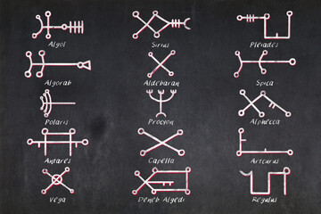 The Fifteen Behenian Stars glyphs used in Astrology an magic drawn on a blackboard