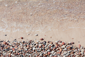 Fototapeta na wymiar little rocks by the beach 