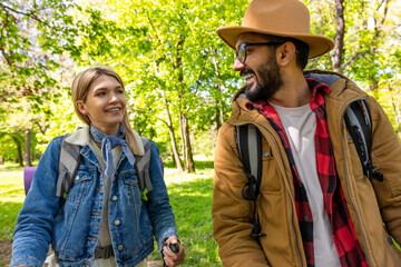 Young smiling travelers on hiking feeling excited and joyful