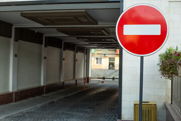 Sign prohibiting passage into the tunnel on the background. No entry symbol on a road sign at the...