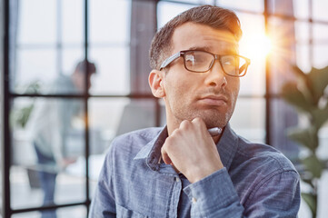 thoughtful male lost in thoughts make plans visualizing, business vision concept