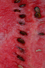pink juicy watermelon with brown seeds