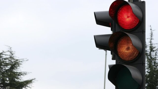 Traffic light at an intersection changing and opening - Slovenia Europe