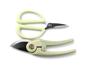 Floral scissors and secateurs with green handle on white background