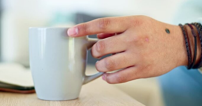 Hand, coffee and thinking with a person in their home to relax in the morning while drinking from a cup. Relax, tea or mug or an adult waiting in a house on the weekend with patience closeup