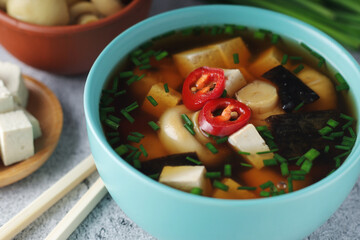 A bowl with miso soup, traditional Japanese dish