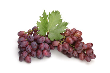 Fresh rose grapes with leaf on white.