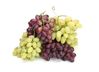 Fresh pink violet, green grapes bunch on light background.