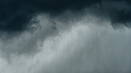 storm sky, dark dramatic clouds during thunderstorm, rain and wind, extreme weather, abstract...