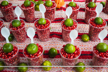 Pomegranate fruit on glasses displayed in Mexican market