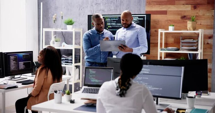 African Business Team Working On Computer
