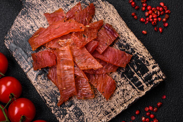Delicious dried veal or turkey jerky with salt, spices and herbs