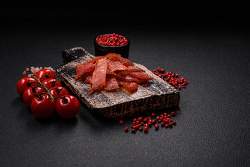Delicious dried veal or turkey jerky with salt, spices and herbs