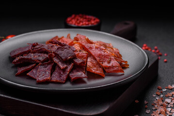 Delicious dried veal or turkey jerky with salt, spices and herbs