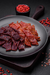 Delicious dried veal or turkey jerky with salt, spices and herbs