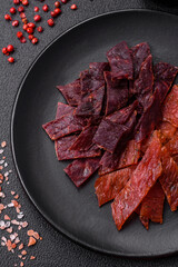 Delicious dried veal or turkey jerky with salt, spices and herbs