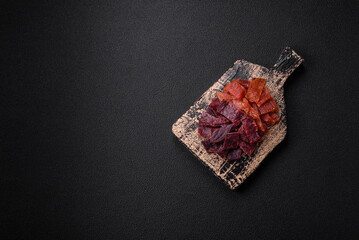 Delicious dried veal or turkey jerky with salt, spices and herbs