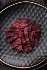Delicious dried veal or turkey jerky with salt, spices and herbs