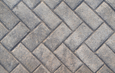 Stamped concrete floor texture background. Rough and grunge surface background.