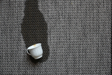 cup of coffee spilled on carpet 