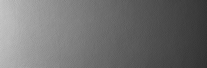 Abstract background, wide banner with gray gradient leather texture. Genuine structure, luxury pattern. Gradient, wallpaper, panoramic, wide, web banner, design element, backdrop.