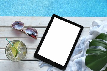Summer vacation beach read on computer tablet or e-reader book cover blank screen mock up. 