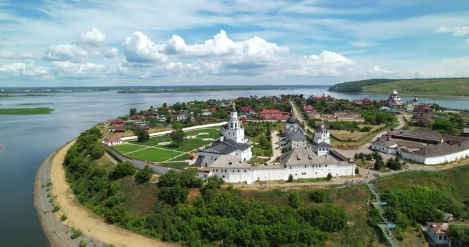 Aerial shot Island-city of Sviyazhsk. An island at the confluence of the Sviyaga River with the Volga. Orthodox church on the island of Sviyazhsk. Orthodox temple
