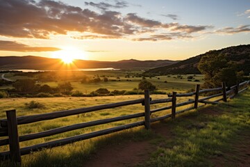 Fototapeta na wymiar A New Day's Promise: Gazing upon the Idyllic Beauty of a Fenced Ranch in a Picturesque Sunrise Landscape