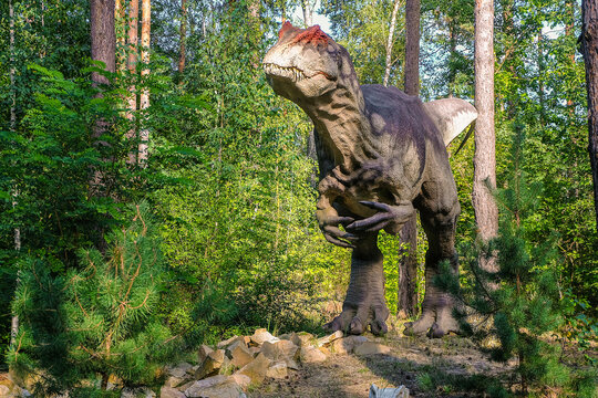 Belgorod, Russia - September 10, 2022: Full-size statue of allosaurus in dinopark of Belgorod city.