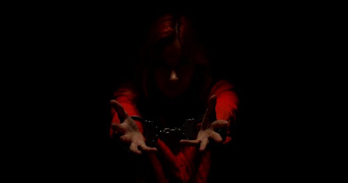 Captive Elegance Woman. A Glimpse into the Despondency, Hopelessness, and Enigmatic Innocence of a Shackled Woman in Corporate Attire.