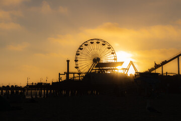 Los Angeles, California, USA, June 21, 2022: View of Santa Monica Beach and the Pier at sunset....