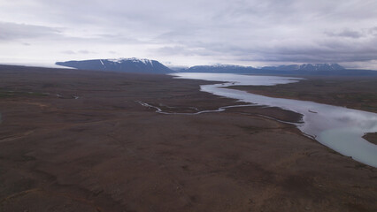 The Hagavatn Lake in the Highland south of Langjokull glacier. Hvitarvatn is a glacier lake in the Icelandic Highlands, feeding the glacier river Hvita in South Iceland.
