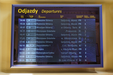 Przemysl, Subcarpathian, Poland - 22 August 2023: electronic departure board at the main train station building in Przemyśl