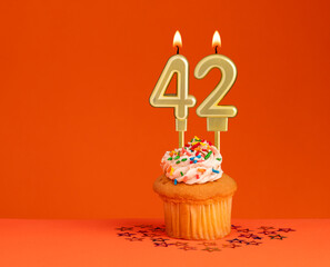 Number 42 candle - Birthday card design in orange background