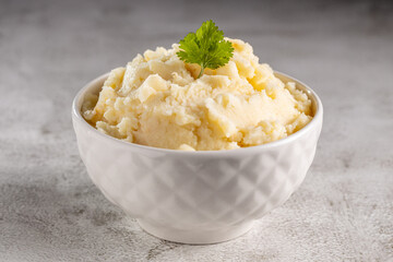 Mashed potato in the bowl. Potato puree.