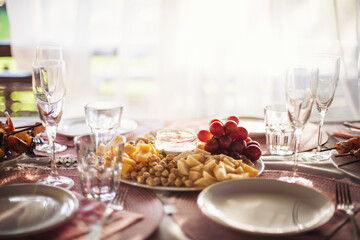 Snacks for the holiday, catering. Various light snacks. Catering plate. Assortment of sandwiches on the buffet table. meat, fish, nuts, cheese, vegetable canapes ofcelebration of important event. 