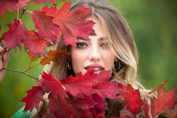 Autumn romance woman with leaves. Female model on foliage day. Dream and lifestyle. Beauty outdoor...
