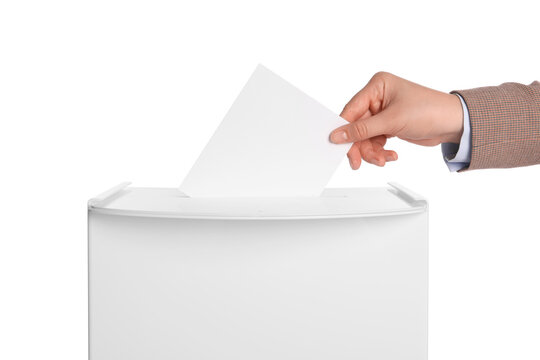 Woman putting her vote into ballot box on white background, closeup